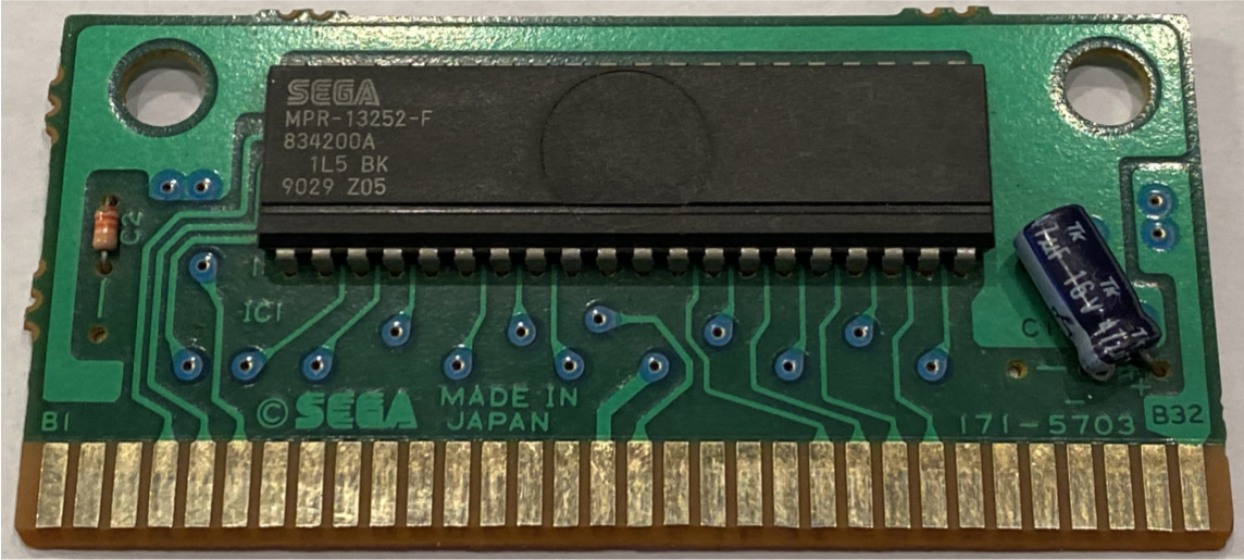 Same Sega MegaDrive game cartridge circuit board with its edge connector and ROM chip.